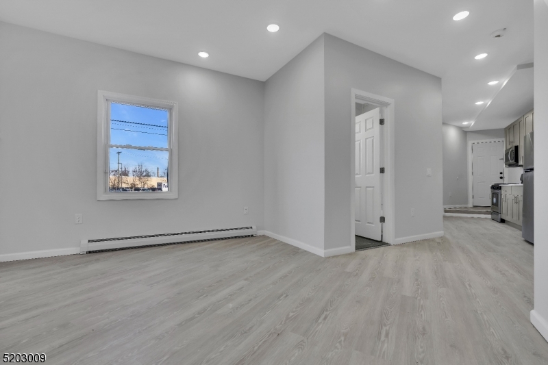 167 Smith Street, Unit 1L Elizabeth, NJ 07201 - Photo 6 of 8 a view of an empty room with a window