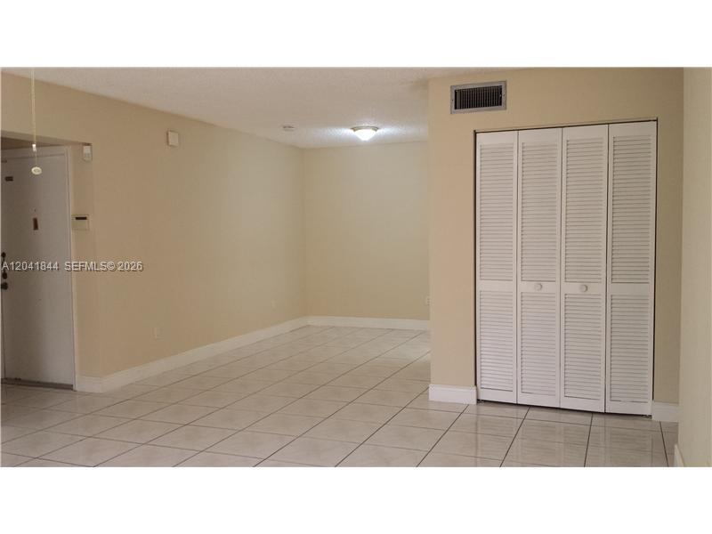 8610 Southwest 149th Avenue, Unit 504 Miami, FL 33193 - Photo 6 of 13 a bathroom with a sink and a shower