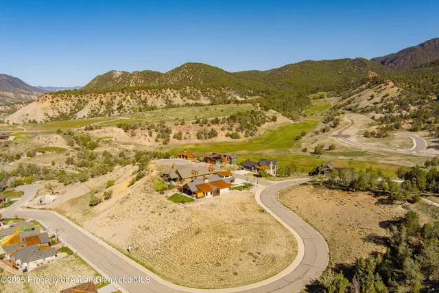 a view of a swimming pool with a lake