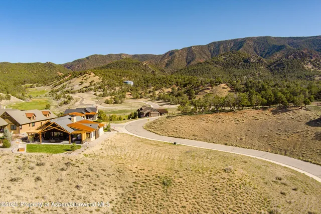 a view of a ocean with a mountain