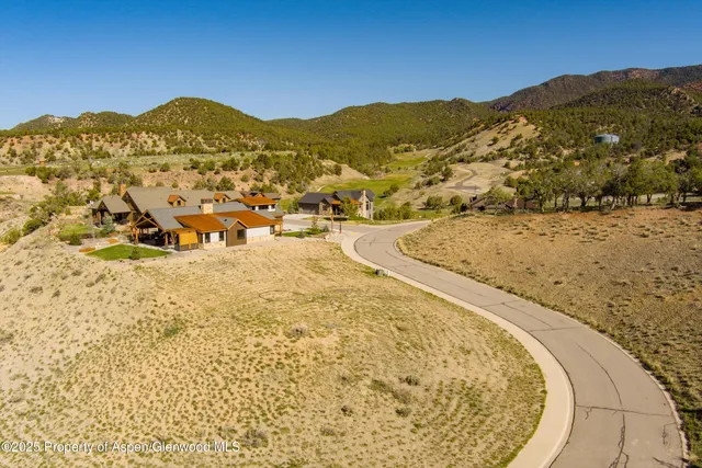 a view of a backyard of a house