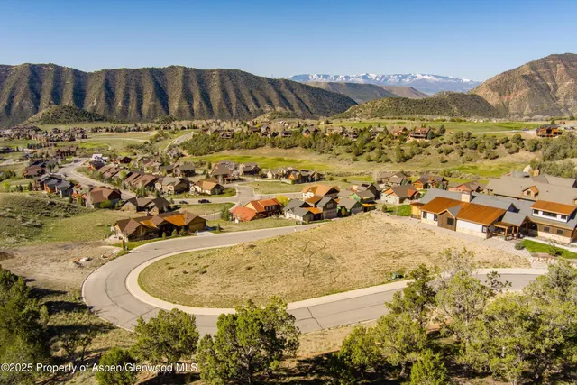 a view of swimming pool with a yard