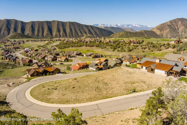 a view of swimming pool with a yard