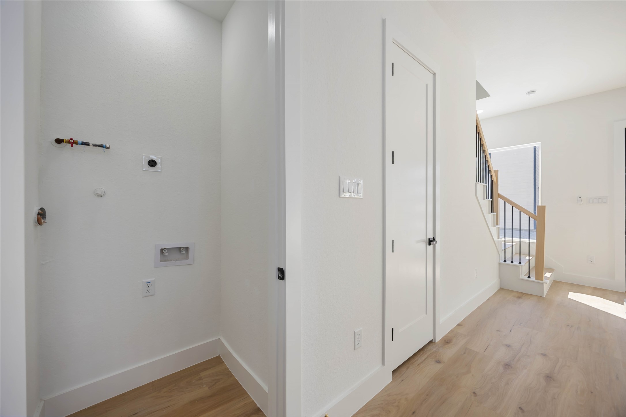 4533 Bricker Street Houston, TX 77051 - Photo 13 of 21 a view of a hallway with wooden floor