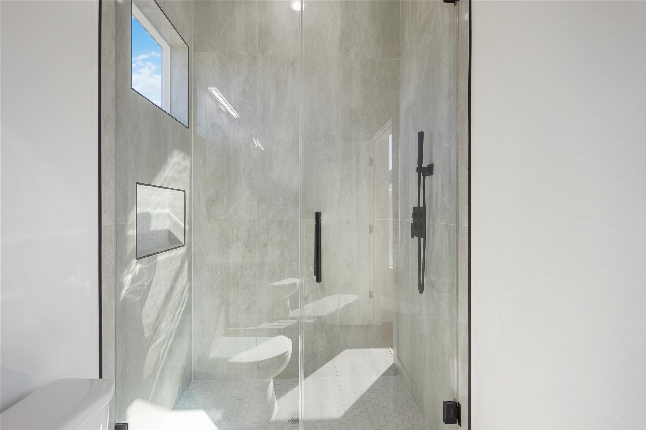 4533 Bricker Street Houston, TX 77051 - Photo 20 of 21 a bathroom with a shower and a toilet