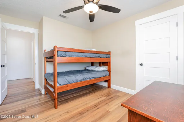 a bedroom with bunk bed