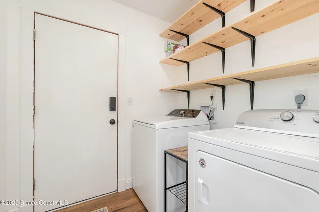 a utility room with dryer and washer