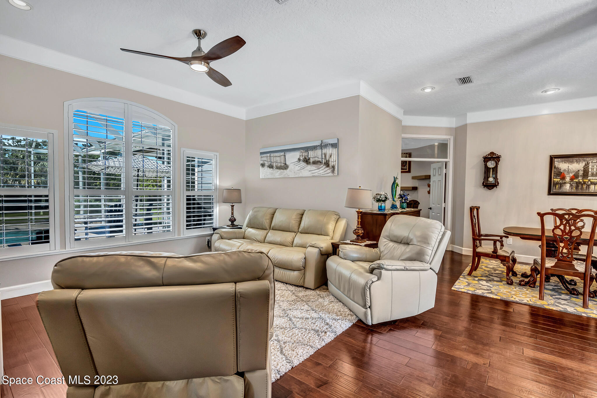 4320 Canard Road Melbourne, FL 32934 - Photo 25 of 78 a living room with furniture and a large window