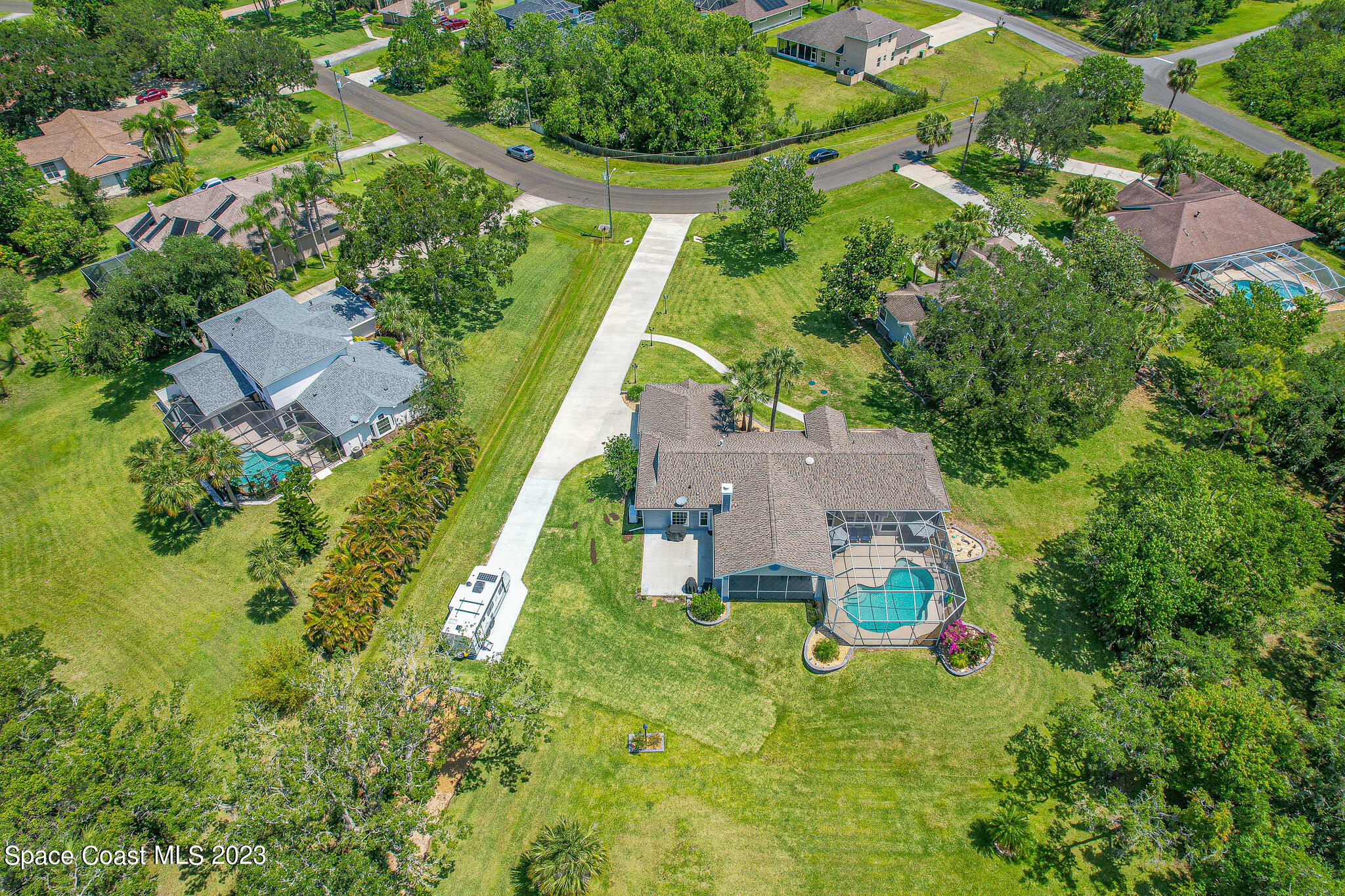 4320 Canard Road Melbourne, FL 32934 - Photo 73 of 78 an aerial view of residential house with outdoor space and trees all around