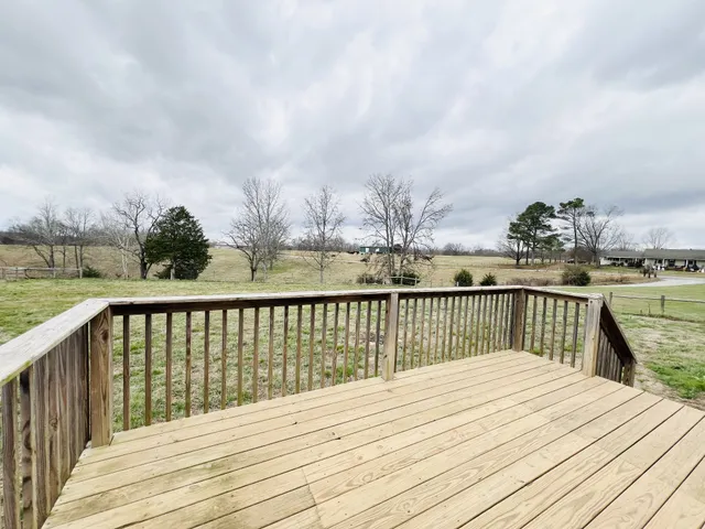 a view of an swimming pool and a yard
