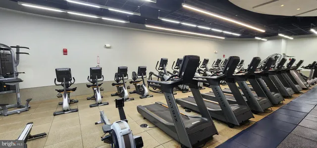 a group of room with lots of gym equipment