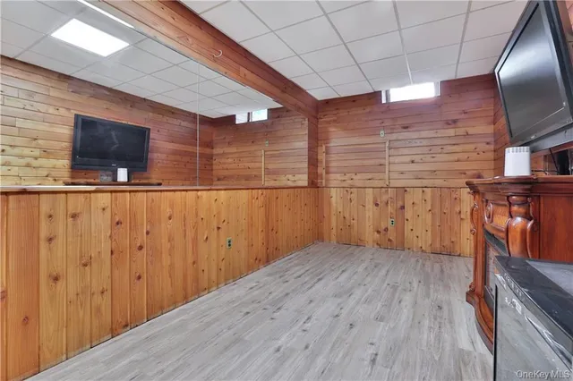 a view of a livingroom with wooden floor
