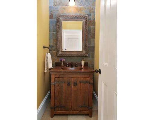 43 Hillside Road Newton, MA 02461 - Photo 12 of 17 a bathroom with a sink and a mirror