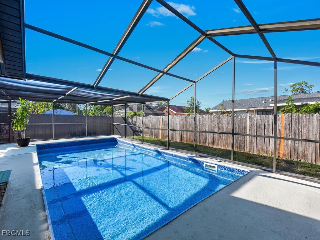 9041 Hamlin Road West Fort Myers, FL 33967 - Photo 26 of 34 a view of a backyard
