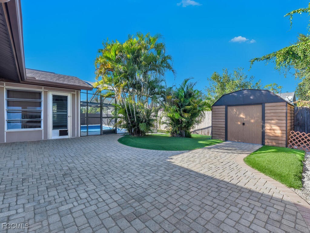 9041 Hamlin Road West Fort Myers, FL 33967 - Photo 28 of 34 a house view with a garden space