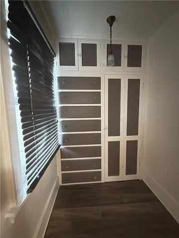 a view of a house with a large window