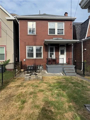 a house view with a outdoor space