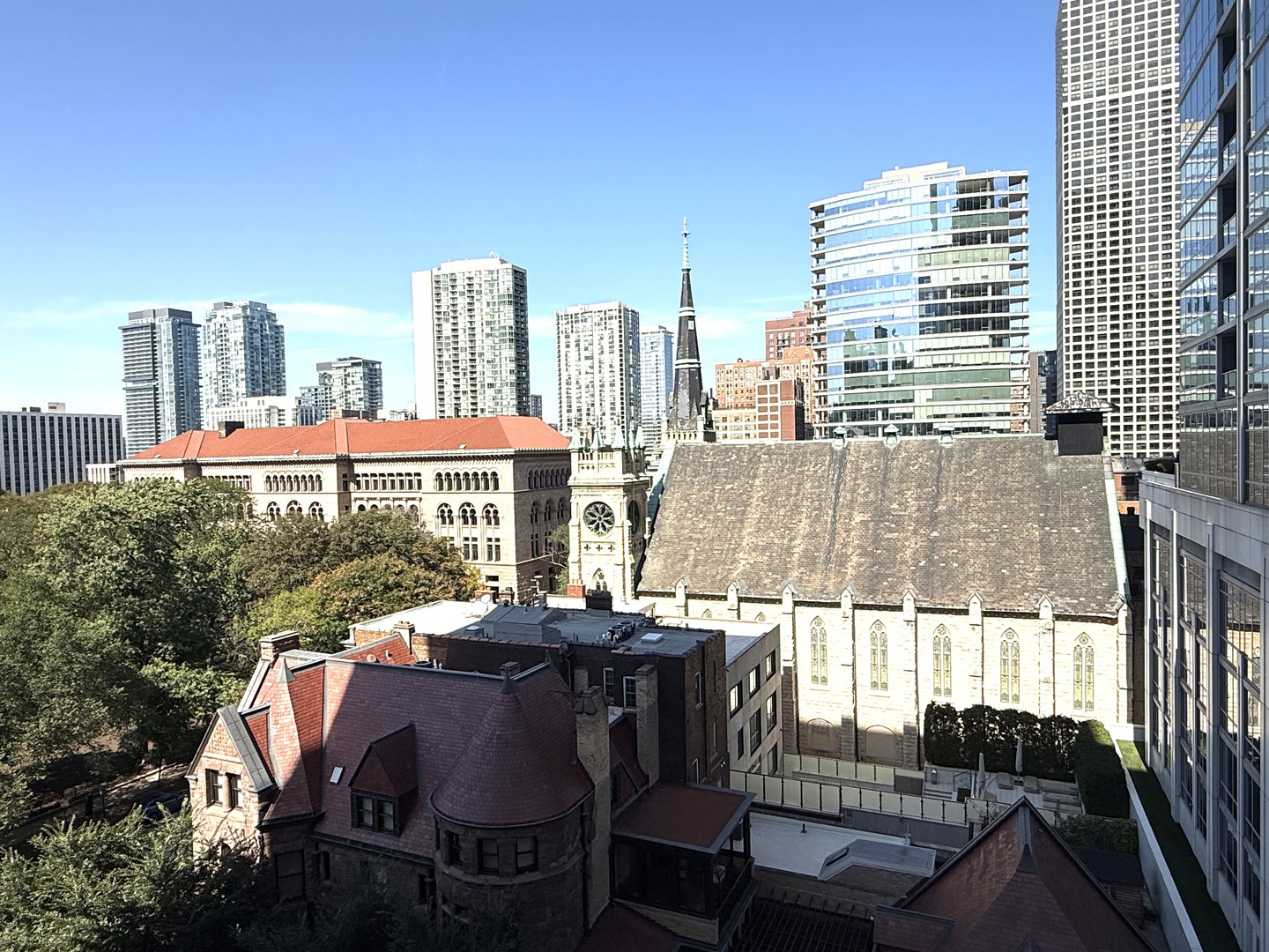 33 West Delaware Place, Unit 9D Chicago, IL 60610 - Photo 29 of 32 a view of a city with tall buildings