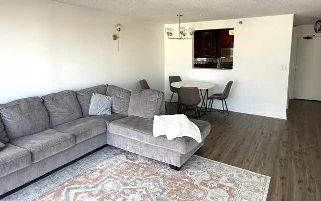 a living room with a couch and a flat screen tv