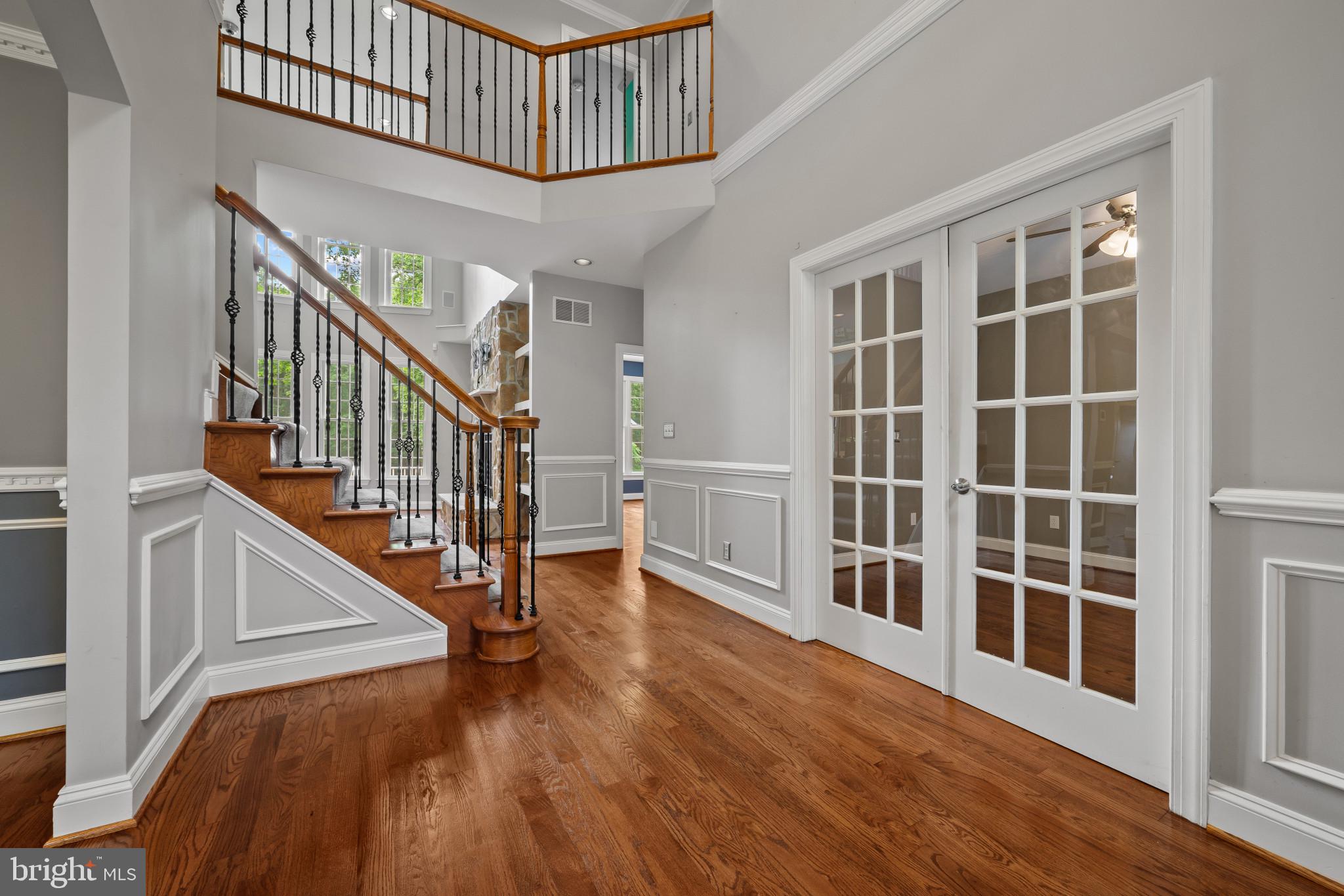 12221 Jerusalem Road Kingsville, MD 21087 - Photo 12 of 66 a view of an entryway with wooden floor and stairs