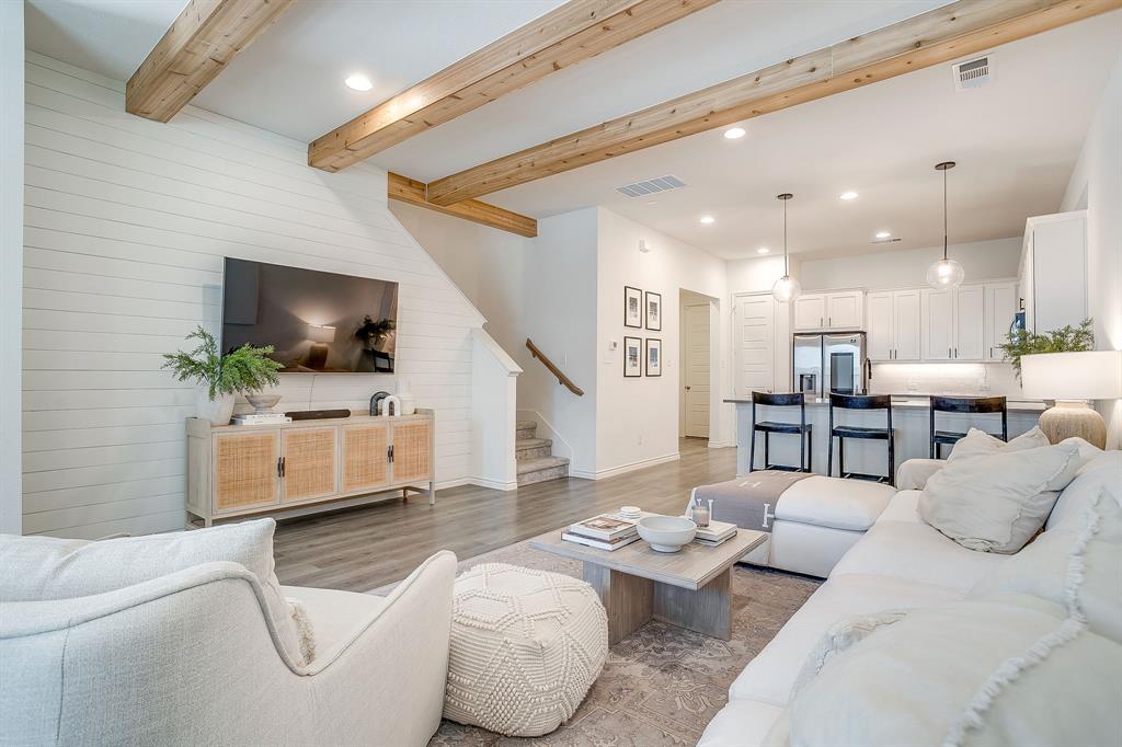 2829 Stanley Avenue Fort Worth, TX 76110 - Photo 1 of 40 a living room with furniture and a flat screen tv