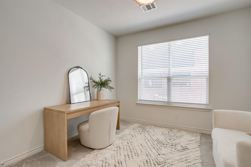 2829 Stanley Avenue Fort Worth, TX 76110 - Photo 25 of 40 a view of a livingroom with furniture and a window