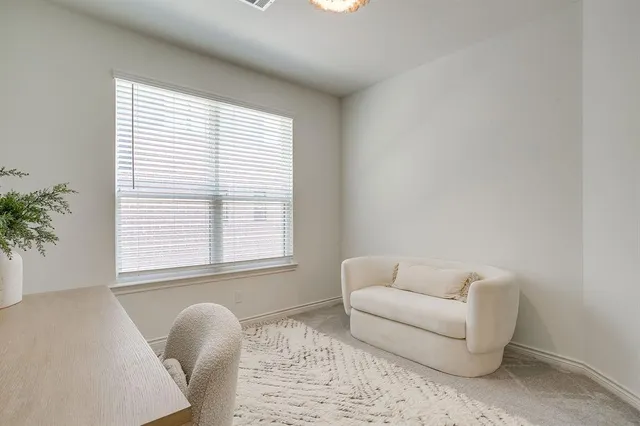 an empty room with closet area