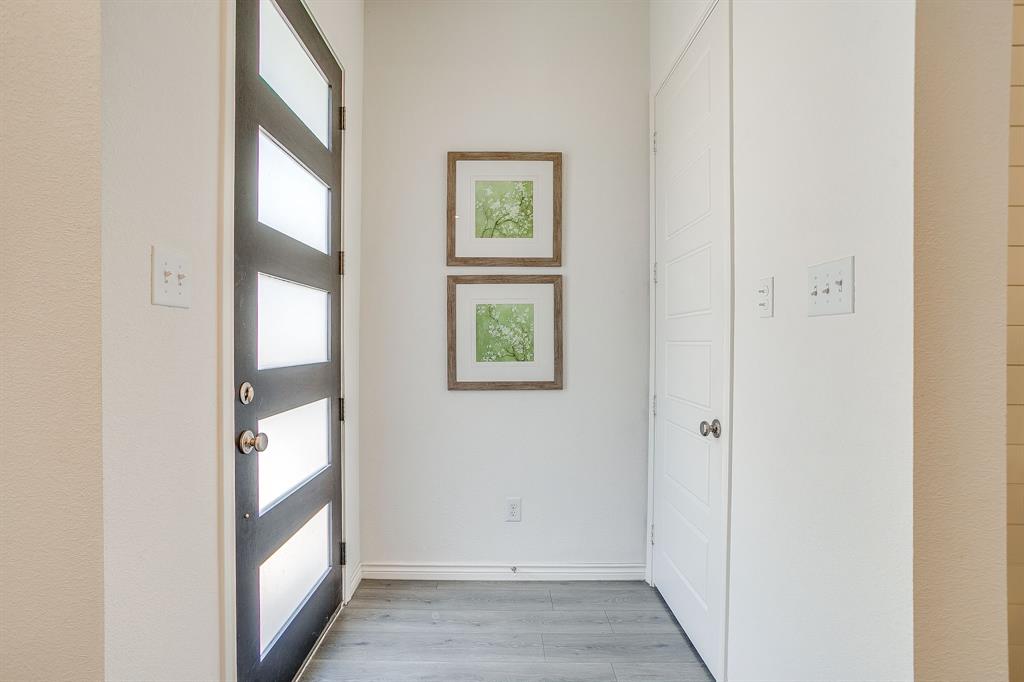 2829 Stanley Avenue Fort Worth, TX 76110 - Photo 33 of 40 a view of an entryway with wooden floor