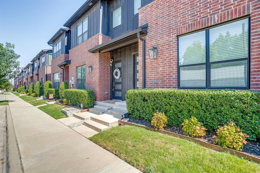 2829 Stanley Avenue Fort Worth, TX 76110 - Photo 35 of 40 a front view of a house with a yard and plants