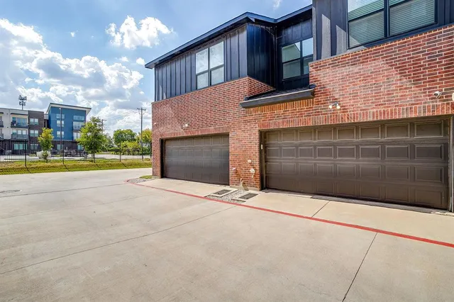 a view of a pathway door front of a house