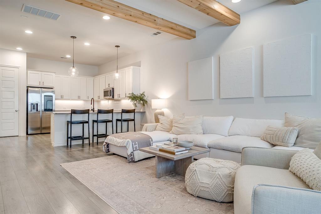 2829 Stanley Avenue Fort Worth, TX 76110 - Photo 5 of 40 a living room with furniture and kitchen view