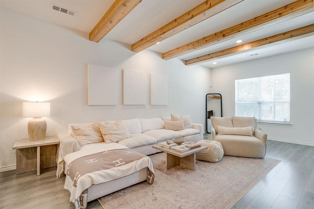 2829 Stanley Avenue Fort Worth, TX 76110 - Photo 9 of 40 a living room with furniture and a window