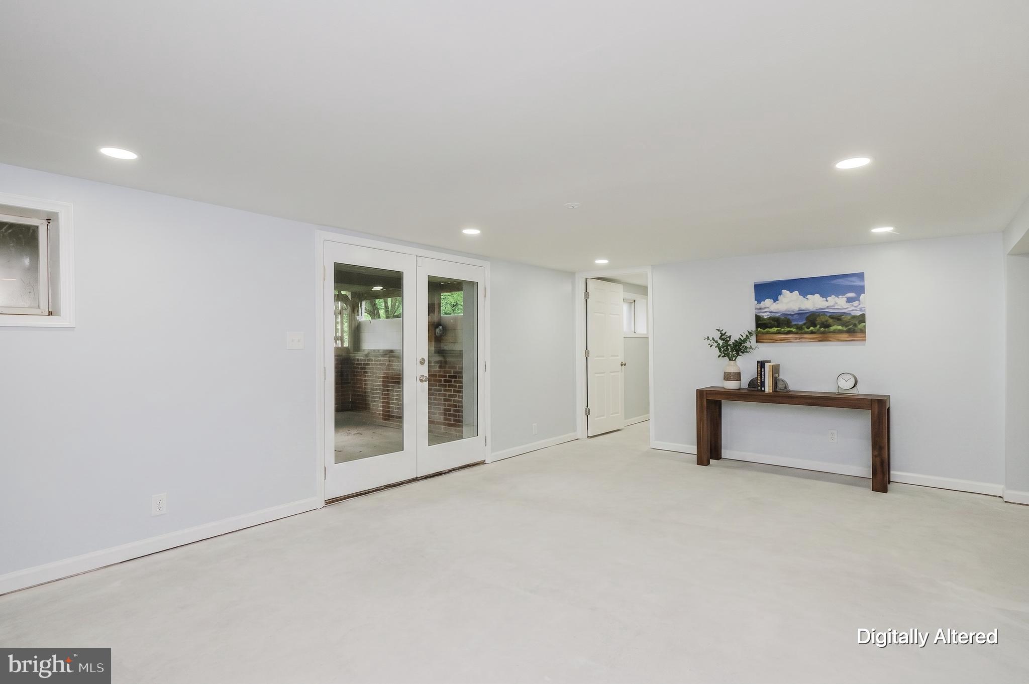 1704 Philadelphia Road Joppa, MD 21085 - Photo 34 of 56 Basement Rec Room with Sliders to Back Patio