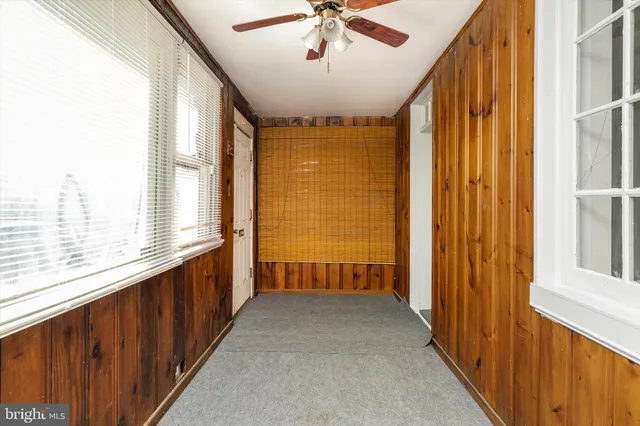 a view of a room with windows