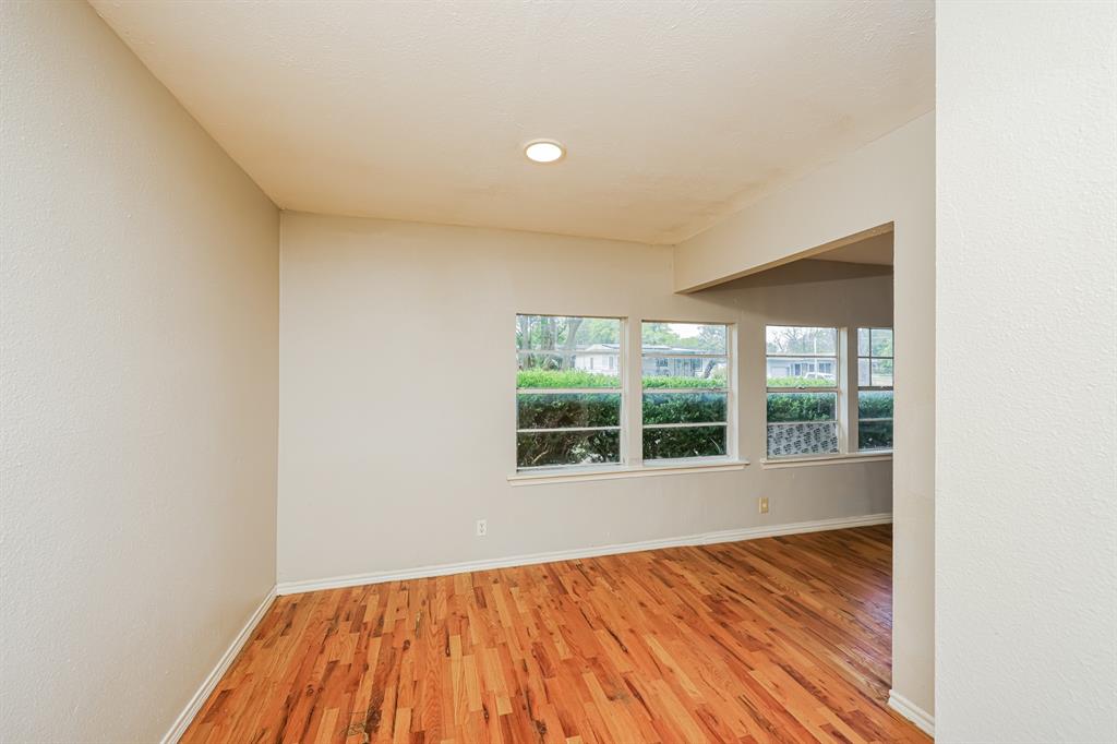 5175 Cardiff Street Dallas, TX 75241 - Photo 4 of 16 Bright room with wood flooring, light-colored walls, and recessed lighting
