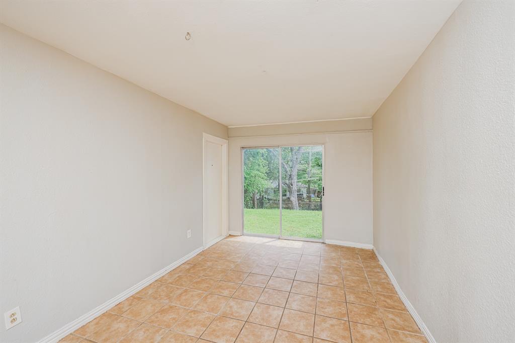 5175 Cardiff Street Dallas, TX 75241 - Photo 7 of 16 The kitchen features hardwood flooring, white cabinetry, granite countertops, and a double basin stainless steel sink