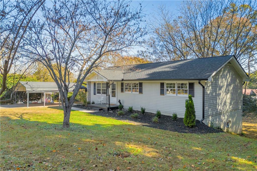 75 Cawthon Road Toccoa, GA 30577 - Photo 2 of 28 a view of a house with swimming pool and sitting area
