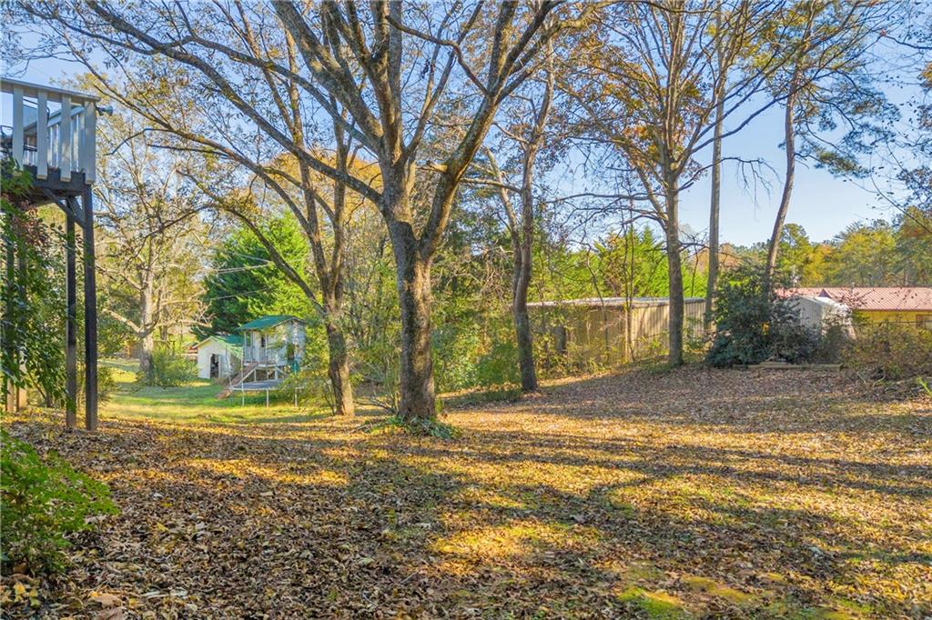 75 Cawthon Road Toccoa, GA 30577 - Photo 6 of 28 a view of a yard with basketball court