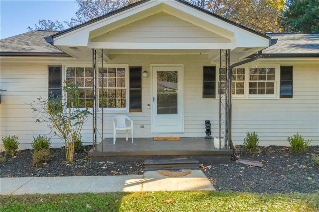 75 Cawthon Road Toccoa, GA 30577 - Photo 7 of 28 a front view of a house with garden