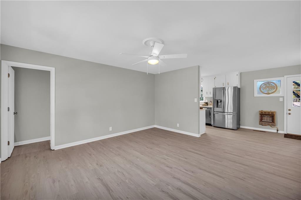 75 Cawthon Road Toccoa, GA 30577 - Photo 9 of 28 a view of a kitchen with a sink and a refrigerator