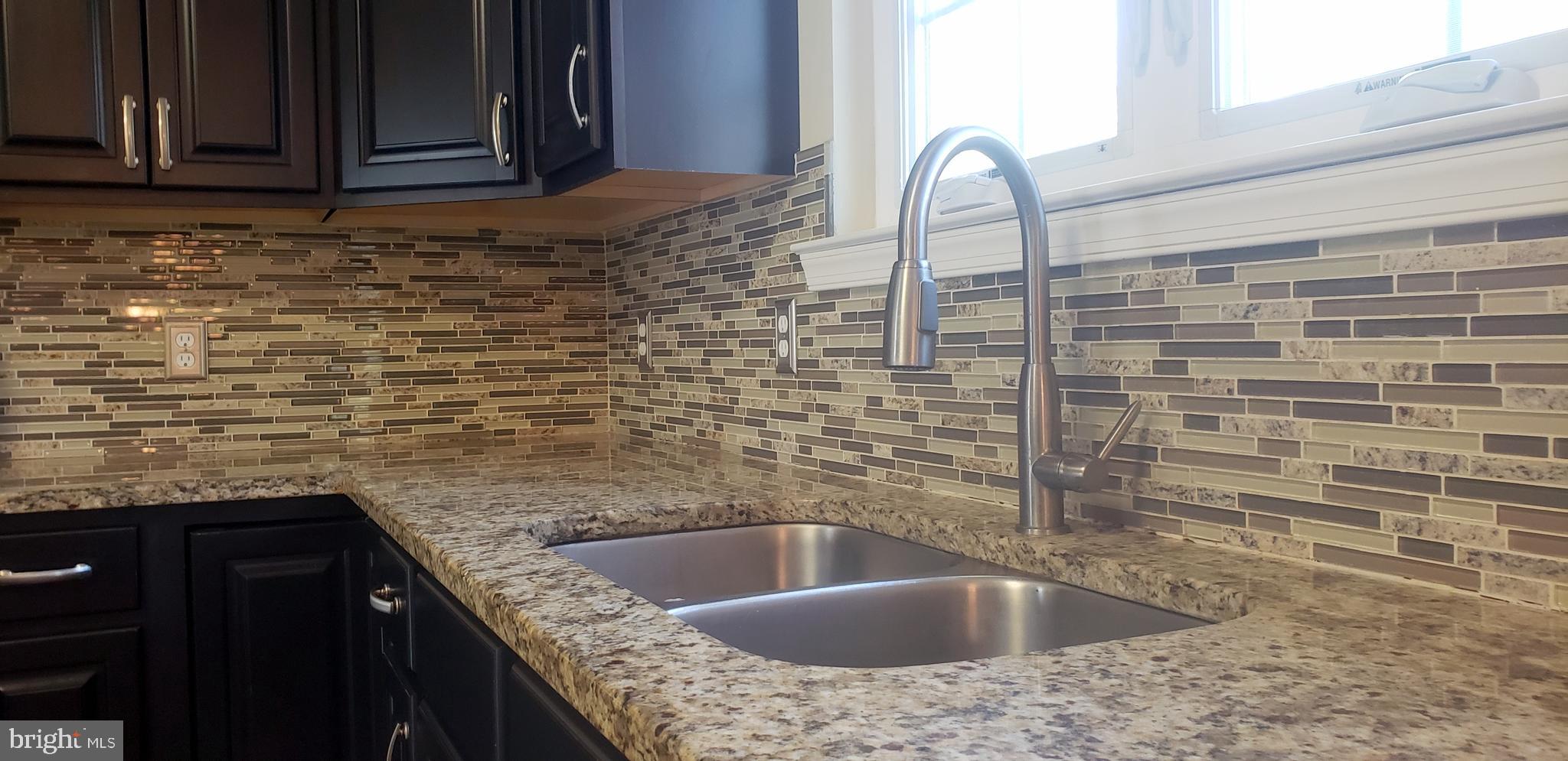1068 Rimrock Road Lusby, MD 20657 - Photo 23 of 48 Granite counters with backsplash