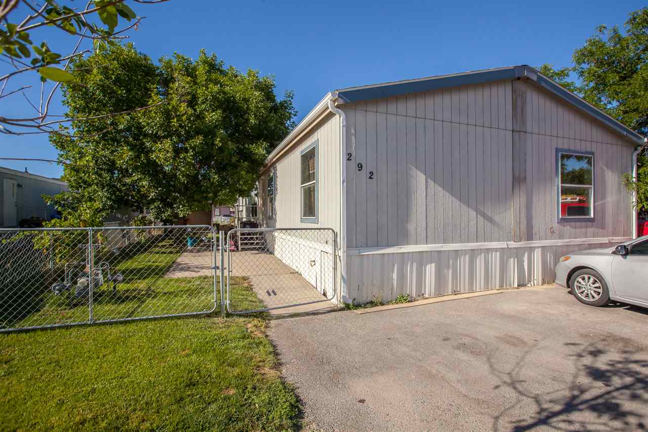 424 32 Road, Unit 292 Clifton, CO 81520 - Photo 1 of 35 a view of a house with backyard and sitting area