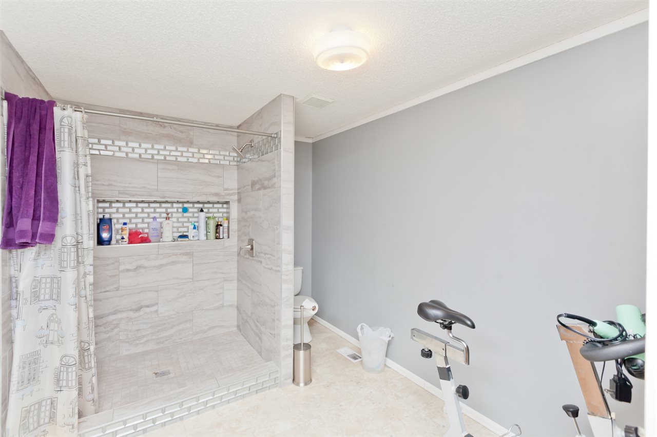 424 32 Road, Unit 292 Clifton, CO 81520 - Photo 18 of 35 a bathroom with a bathtub and a shower
