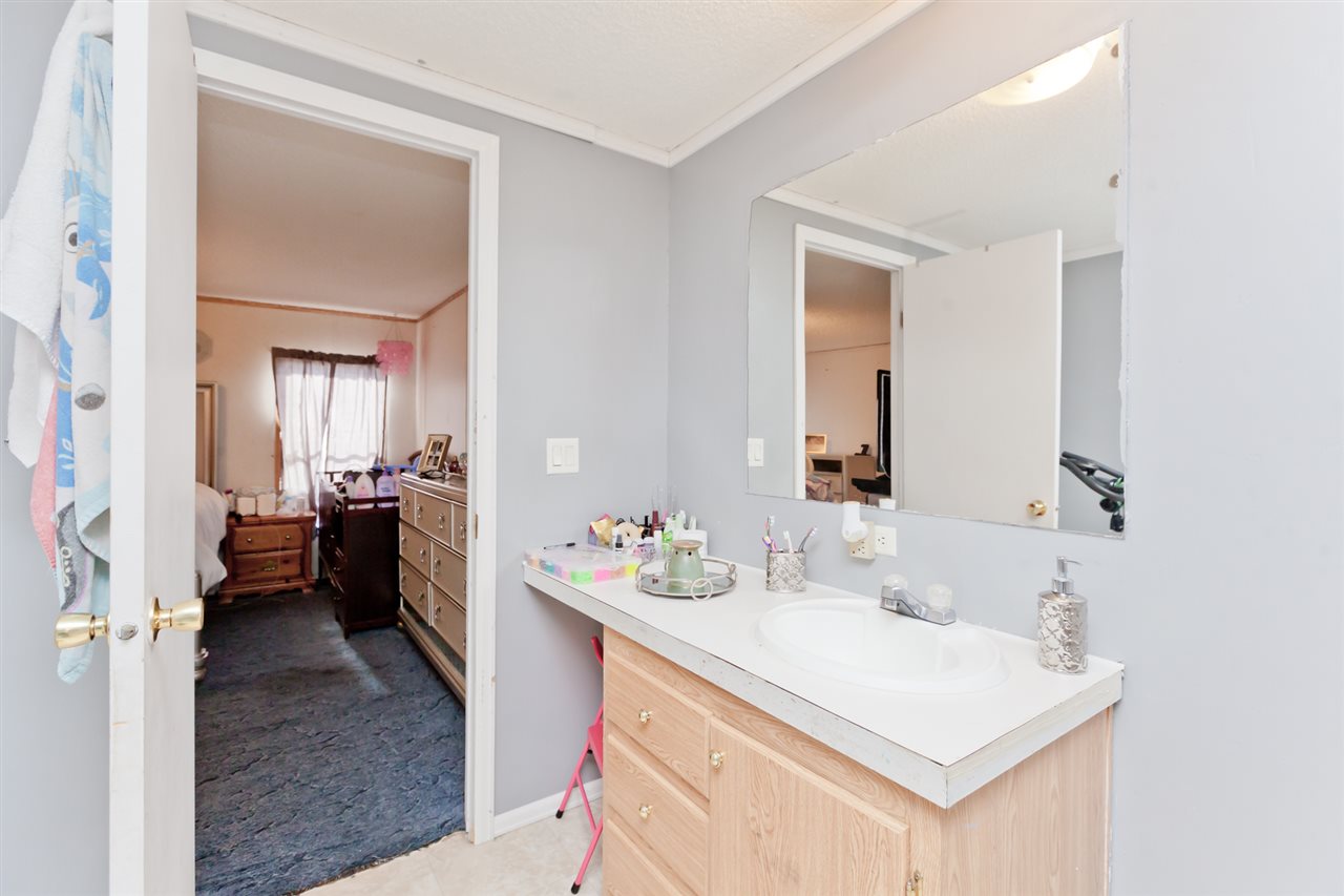 424 32 Road, Unit 292 Clifton, CO 81520 - Photo 20 of 35 a en suite bathroom with a sink a mirror and a shower