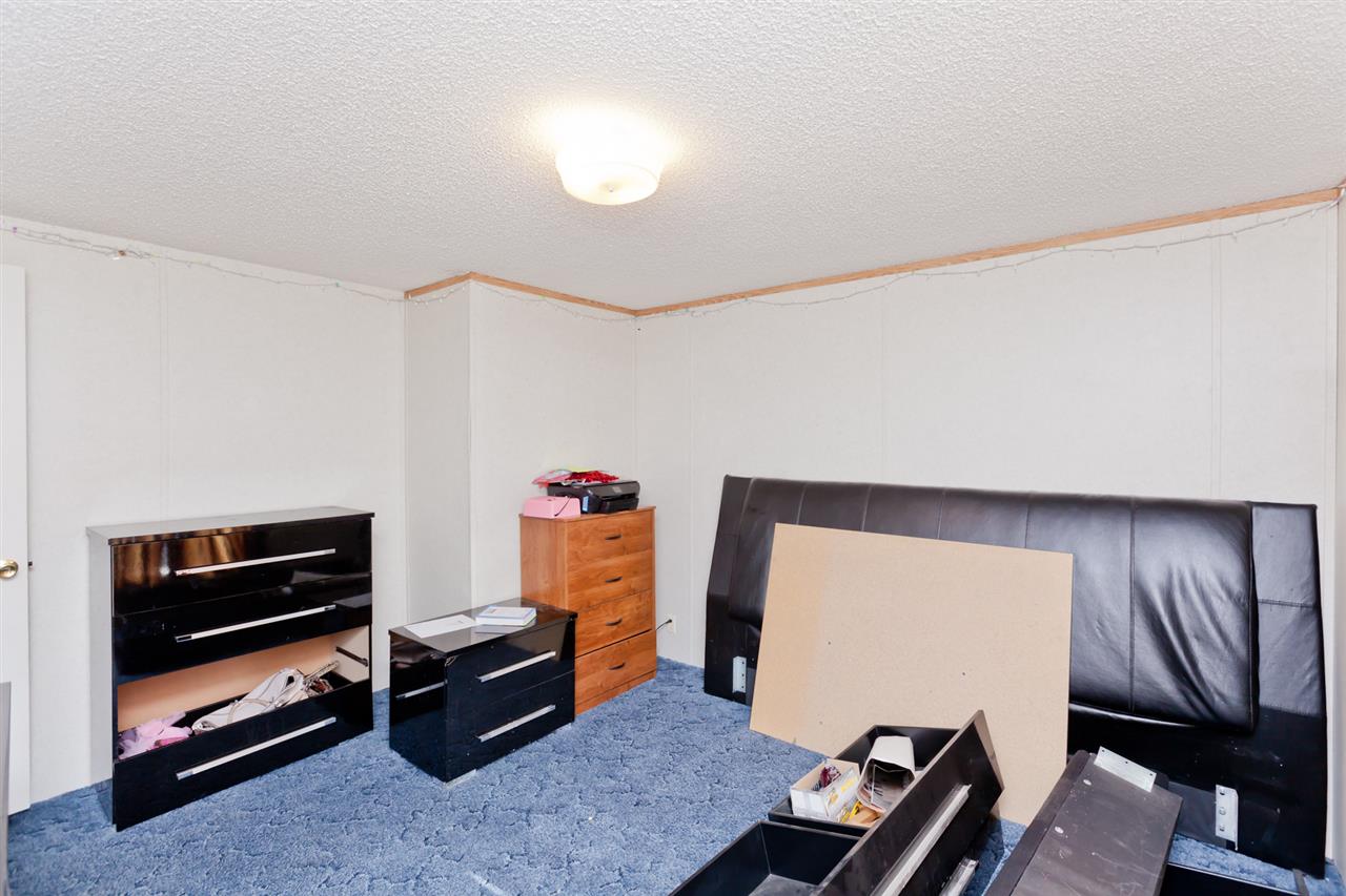 424 32 Road, Unit 292 Clifton, CO 81520 - Photo 25 of 35 a room with furniture and a flat screen tv