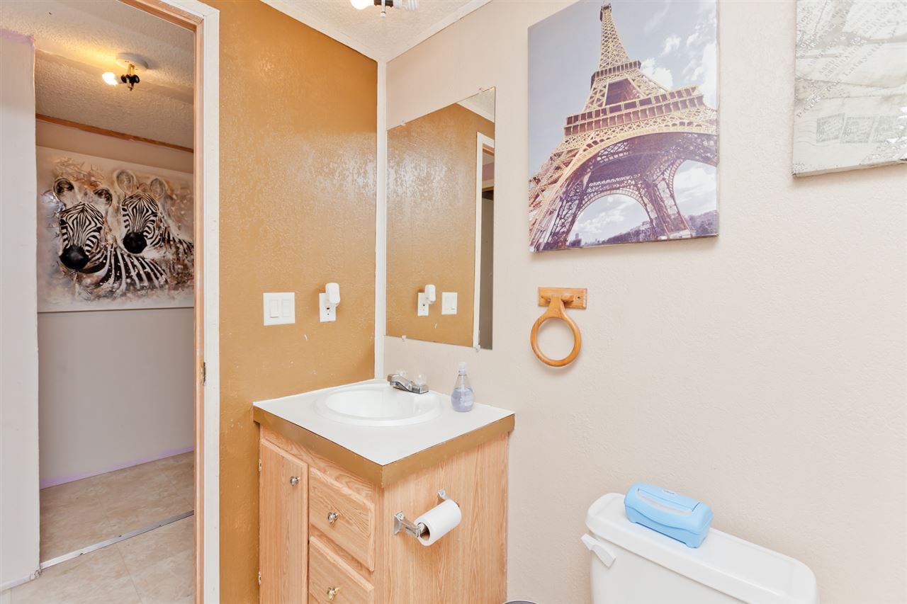 424 32 Road, Unit 292 Clifton, CO 81520 - Photo 28 of 35 a bathroom with a sink and mirror