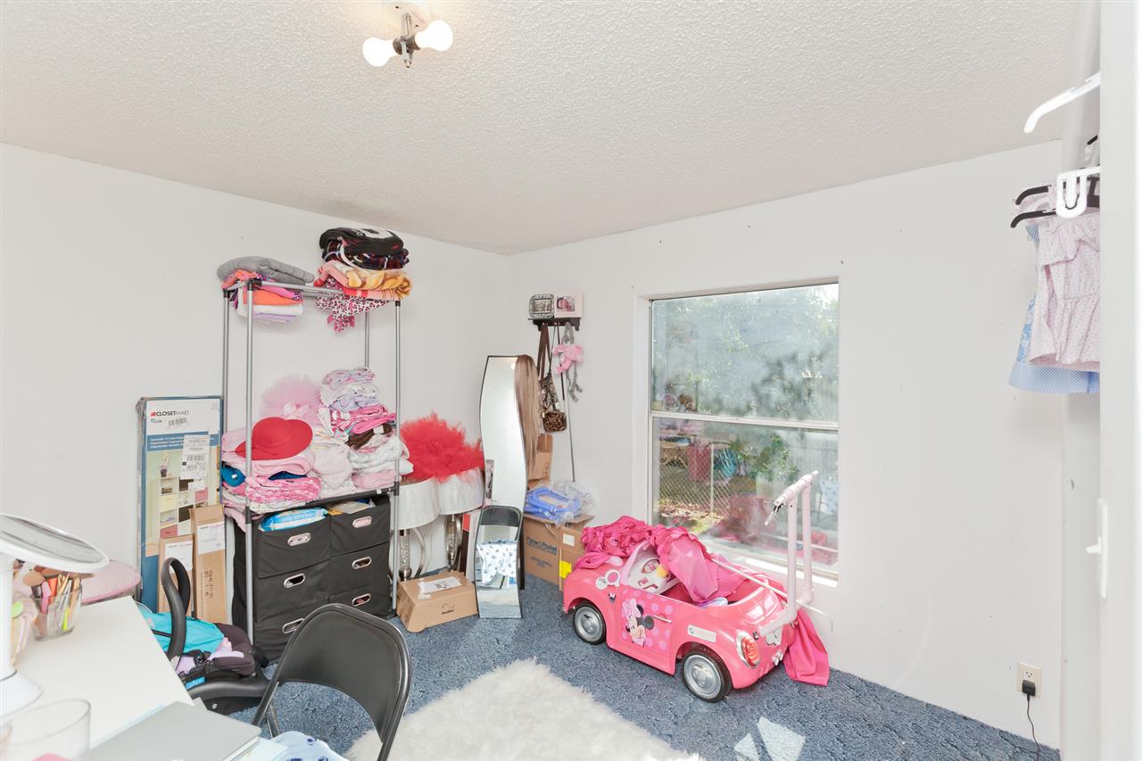 424 32 Road, Unit 292 Clifton, CO 81520 - Photo 29 of 35 a bedroom with a bed and a window