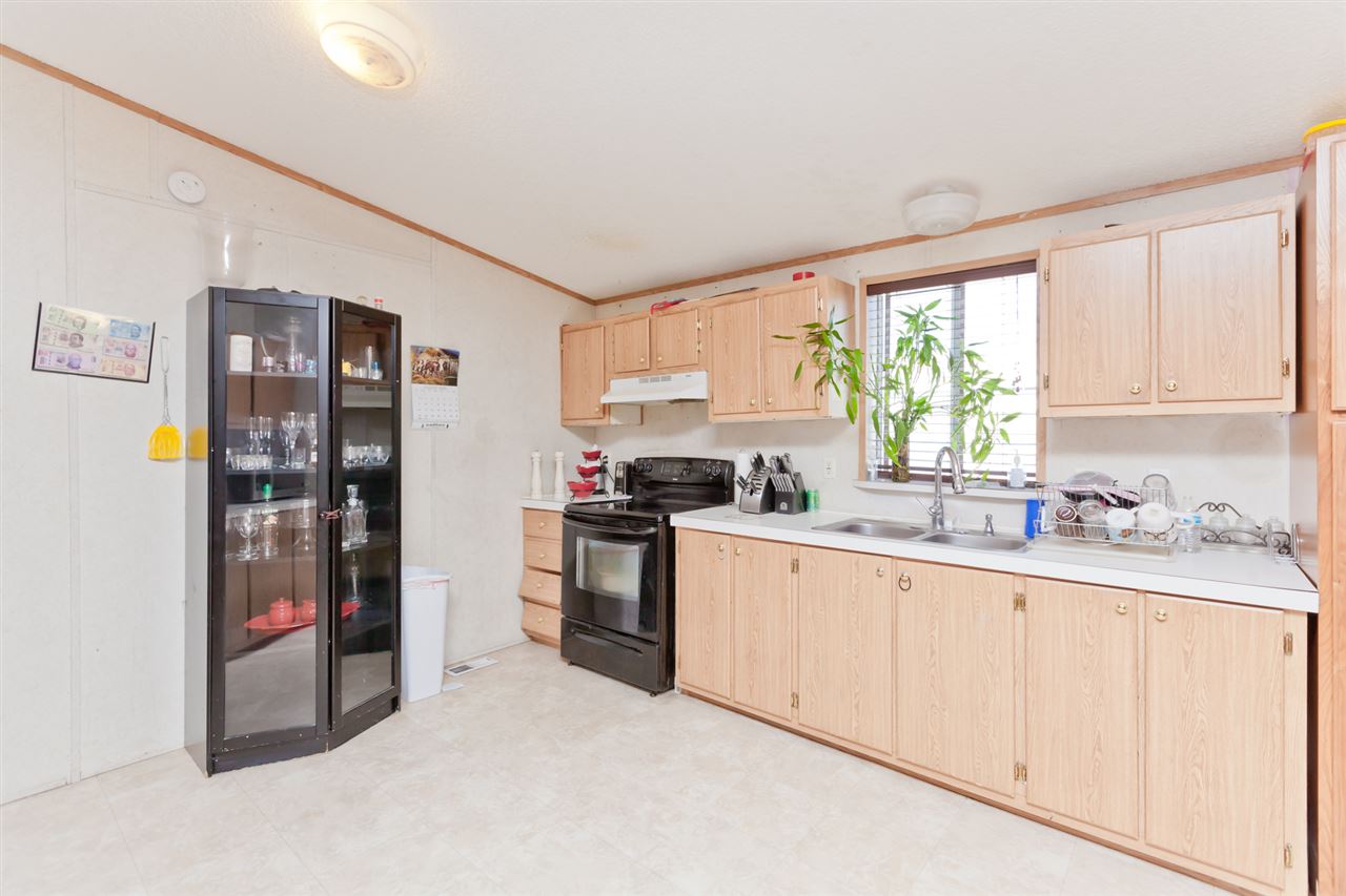 424 32 Road, Unit 292 Clifton, CO 81520 - Photo 7 of 35 a kitchen with stainless steel appliances granite countertop a refrigerator and a sink
