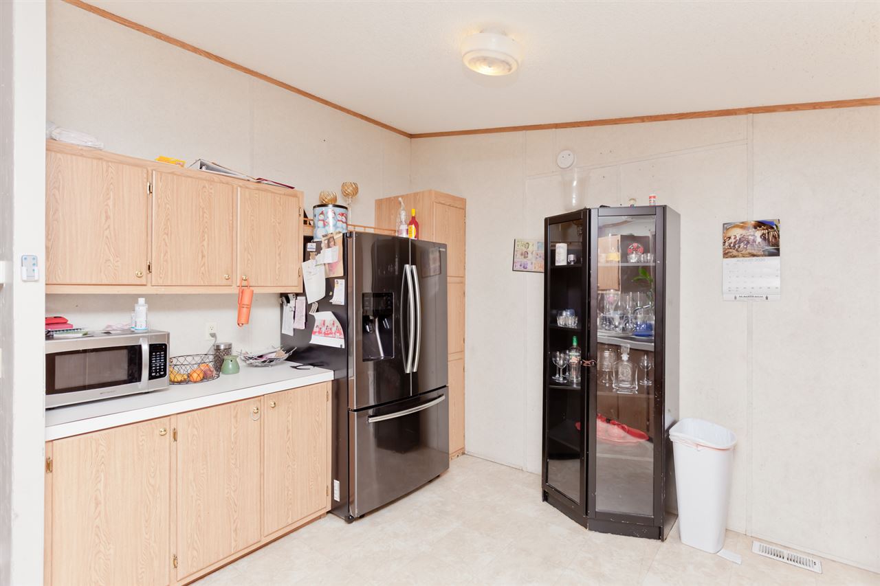 424 32 Road, Unit 292 Clifton, CO 81520 - Photo 8 of 35 a kitchen with stainless steel appliances a refrigerator sink and cabinets