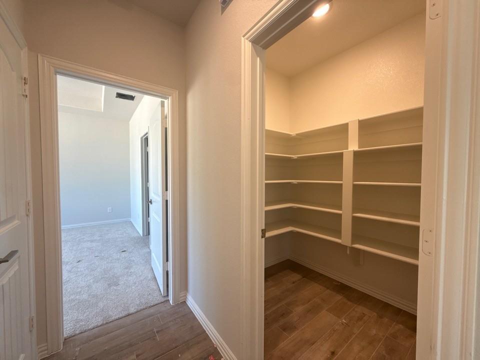156 Oak Grv Way Springtown, TX 76082 - Photo 11 of 17 a view of a room with walk in closet and empty room